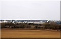 Looking across a field towards Brize Norton Airfield