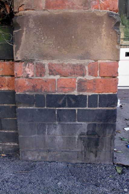 Benchmark on wall pier of #308 Woodborough Road