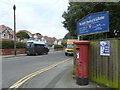 Postbox at the junction of Church and Wollaston Roads