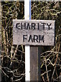 TM4470 : Charity Farm sign by Geographer