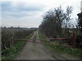 Gated farm track off South Sea Lane Humberston