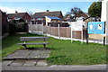 Bench by the village notices