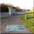 Directions on the pavement alongside Whitehill Way, Swindon