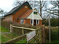 Scout hut and start of footpath near Dragons Green