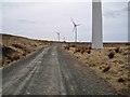 NG3547 : Windfarm access road by Richard Dorrell