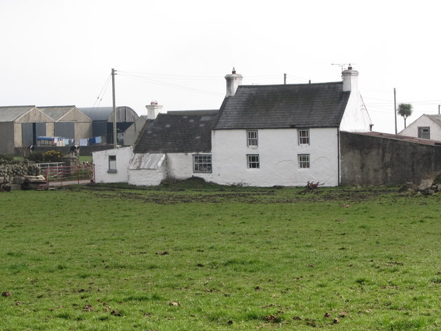 The rear of the whitewashed cottage on Grove Road