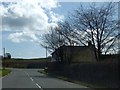 Cottage and road junction at Trow Green