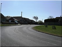 TQ4102 : Bend at the junction of Telscombe Road and Pelham Rise by Dave Spicer