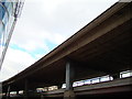 View of the A40 flyover from the Grand Union Canal towpath