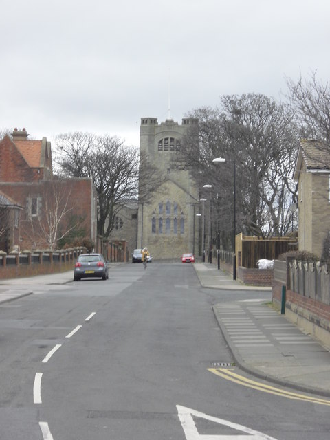 Roker residential street with church with a tower