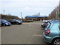 Car park and buildings within Cambridge Regional College