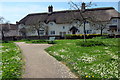 Thatched cottages by the Orchard