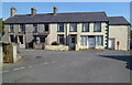 Houses and a postbox in the centre of Nebo