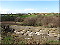 The foundations of a building overlooking the Cully Water valley