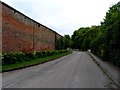 High wall surrounding Hexton Manor