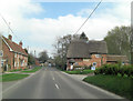 The High Street passes Elm Cottage