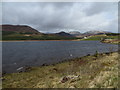 Loch Ailsh with Benmore Lodge in the distance