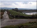 Junction of moorland tracks by old reservoir