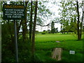 Footpath crosses stream onto golf course