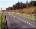 Two signs on the approach to the A487 junction north of Penygroes