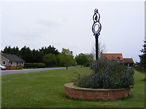 TM4087 : Church Road & Ringsfield Village sign by Geographer