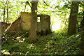 SK9584 : Derelict RAF buildings in Hare's Wood by Richard Croft
