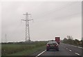 Power lines over A75 near Priestholm