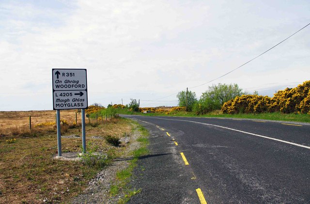 The R351 road approaching the junction with the L4205 road, near Woodford, Co. Galway