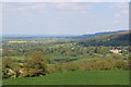 View across the Vale of Evesham from below Belas Knap