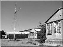 TM5292 : Flag mast by the entrance to Brooke Marine by Evelyn Simak