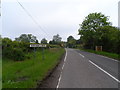 Road into Brinkley with old sign