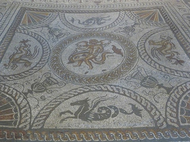 Cupid on dolphin mosaic