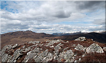 NH3135 : Rocks at un-named top of Carn Gorm by Trevor Littlewood