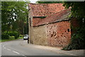 Work in progress on a barn wall at New House Farm