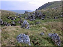 NT1216 : Riven rocks and standing stones above Ellers Cleugh by Ross