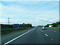 Power lines cross the M6 northbound