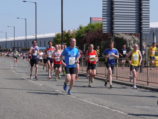 Competitors in the 2013 Blaydon Races at the end of Scotswood Road