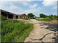 Brick barns and a footpath at The Vinnals