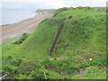 Brick steps on side of gulley above Blast Beach cliffs