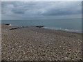 Pebbles piled against groynes on East Beach, Selsey