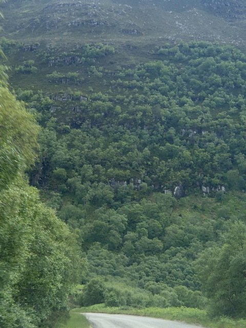 Road towards a steep hillside
