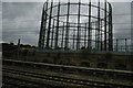 TQ2382 : Gasometer from the train, Kensal Green by Christopher Hilton