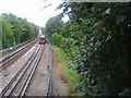 Train passing Hendon Park