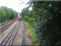 TQ2388 : Train passing Hendon Park by David Howard
