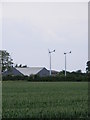 TM2976 : Wind Turbines at Cratfield Hall by Geographer