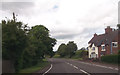 Houses opposite Cottage Farm on A51 at Burston