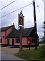 TM3979 : The Triple Plea Public House sign & Broadway Postbox by Geographer