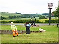 Council worker by the Golden Jubilee Beacon, Fourstones