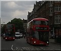 TQ2982 : New Bus for London, Warren Street by Christopher Hilton