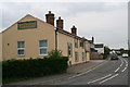 Sharp bend and the road into Legbourne